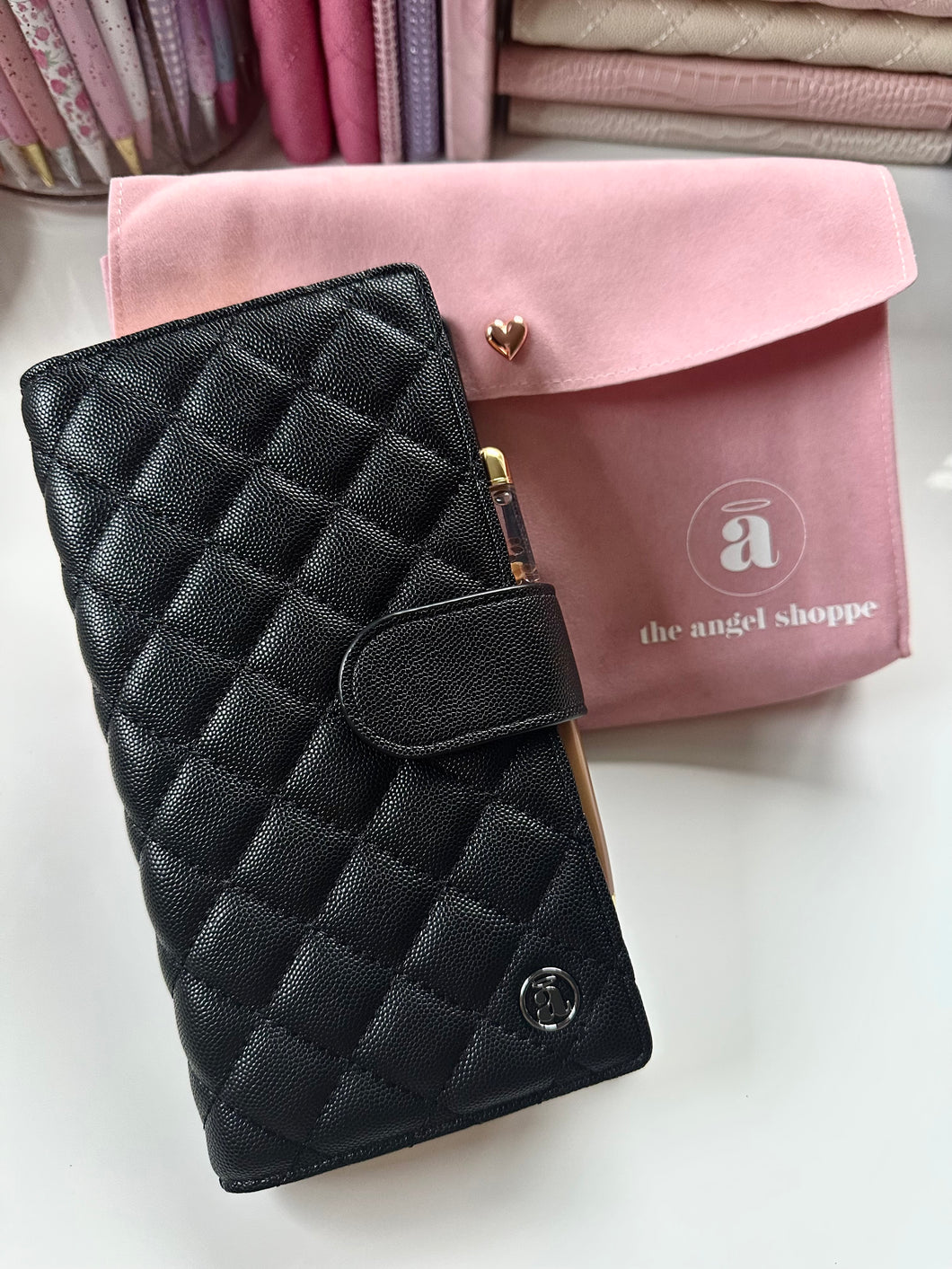 * 4 left * Caviar Black Quilted Weeks Cover