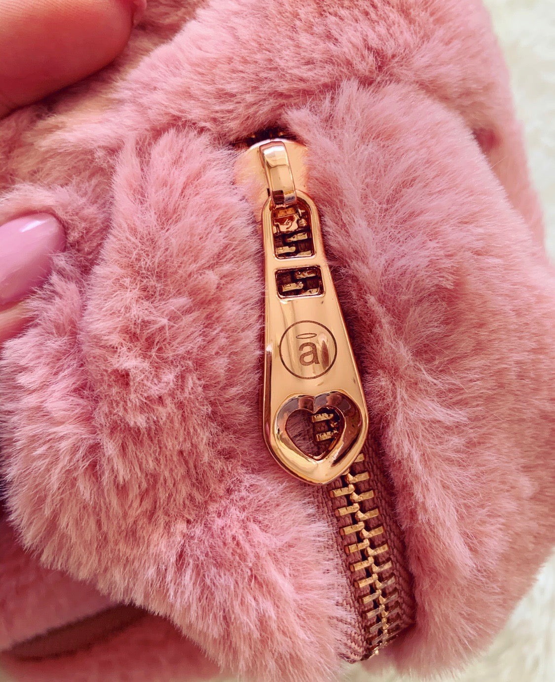 angel FUR POUCHES