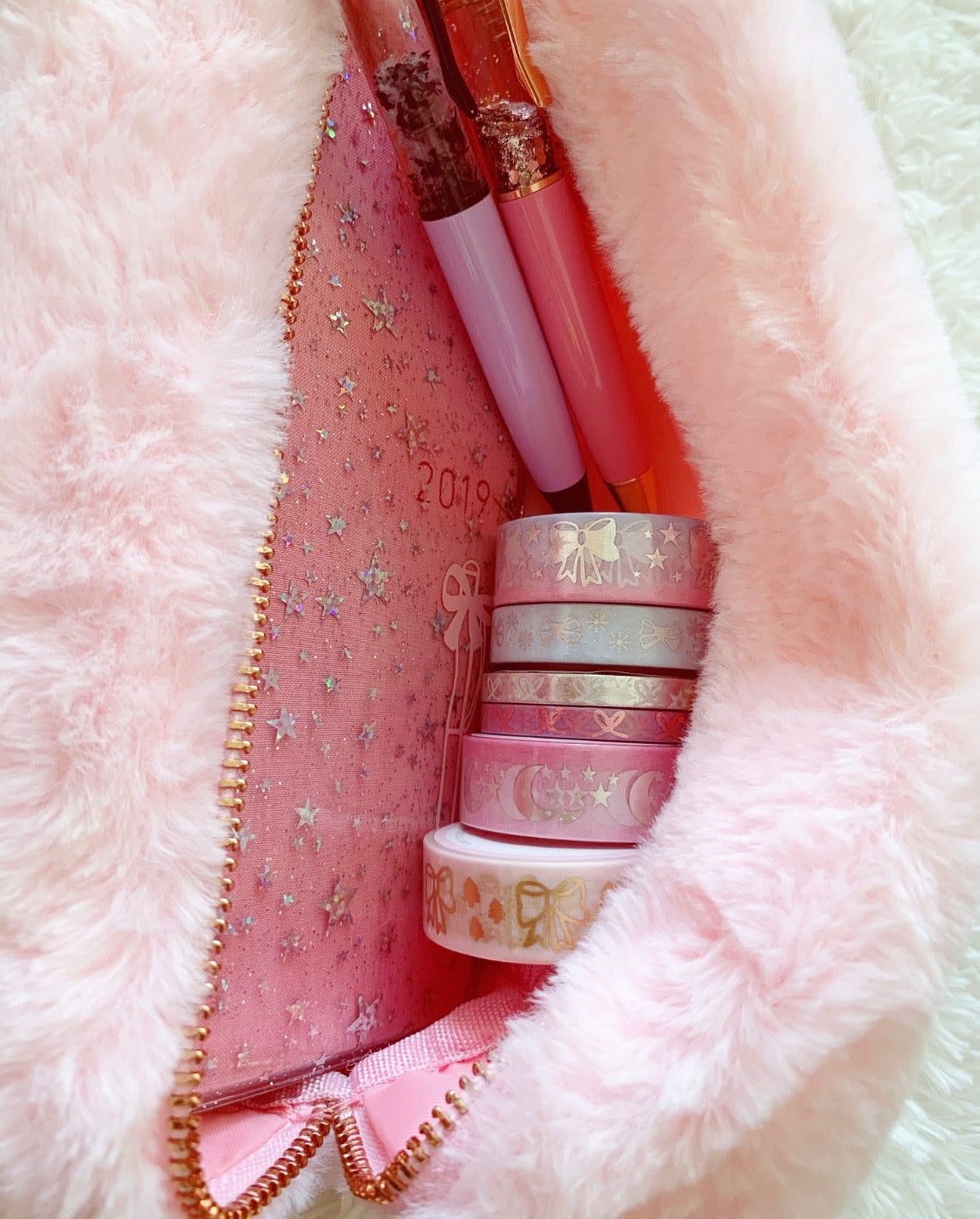 angel FUR POUCHES