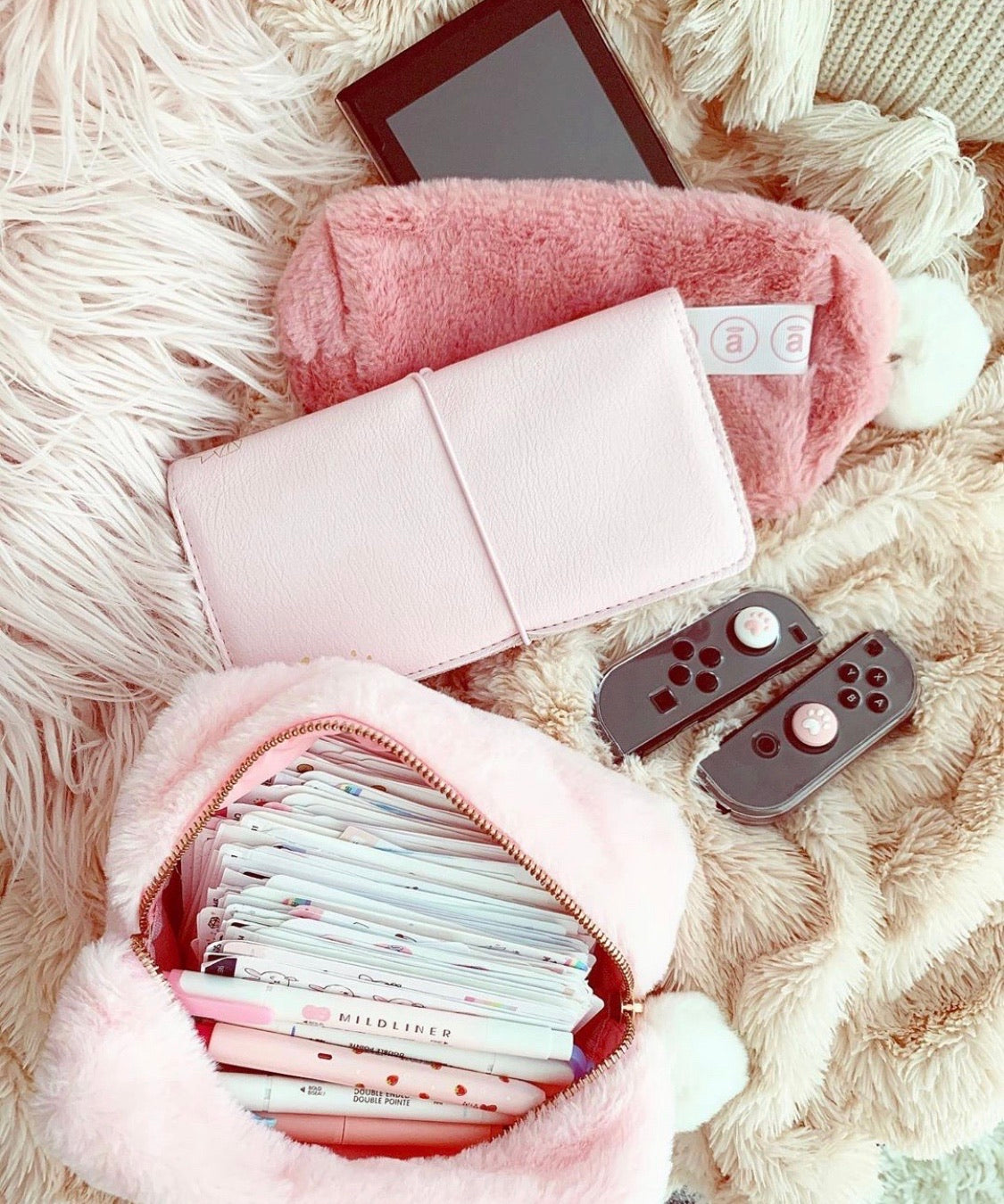 angel FUR POUCHES